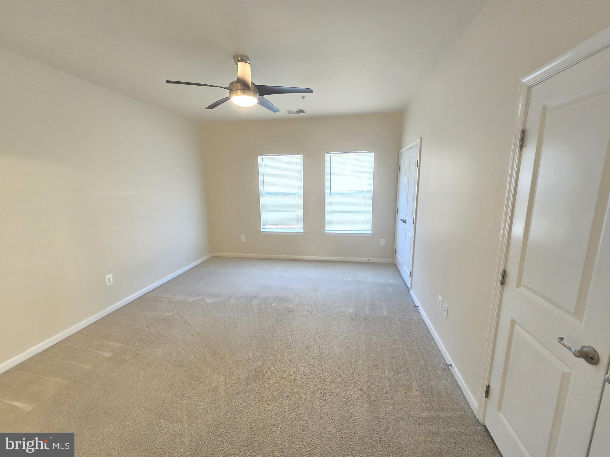 705 South Macon Street Baltimore, MD 21224 - Photo 17 of 29 an empty room with windows and fan