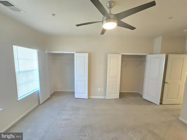 a bathroom with a sink a mirror and a shower