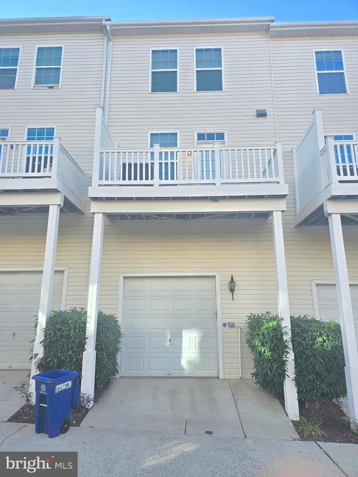 705 South Macon Street Baltimore, MD 21224 - Photo 2 of 29 a front view of a house with a garage