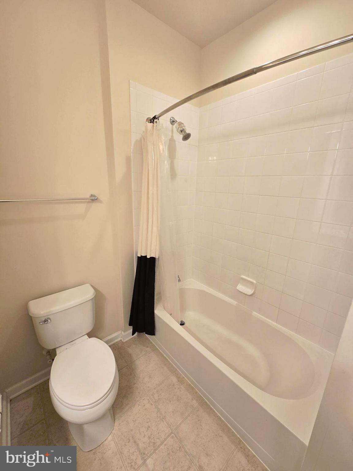 705 South Macon Street Baltimore, MD 21224 - Photo 21 of 29 a bathroom with a toilet and a shower