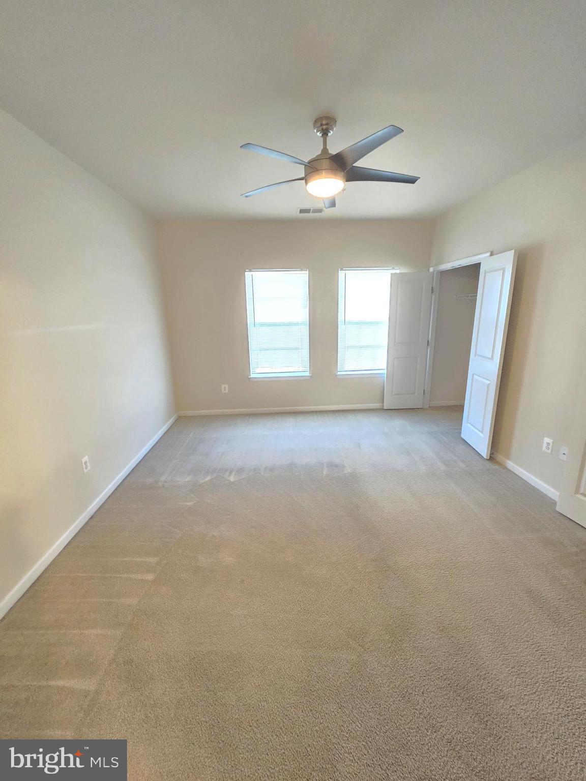 705 South Macon Street Baltimore, MD 21224 - Photo 22 of 29 an empty room with windows and fan