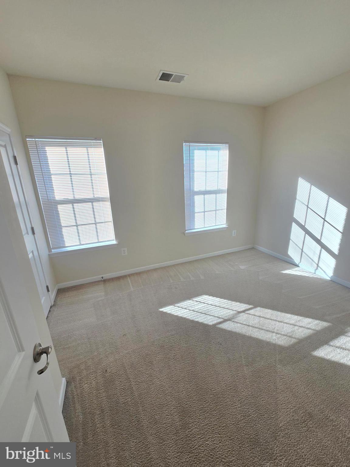 705 South Macon Street Baltimore, MD 21224 - Photo 27 of 29 an empty room with windows