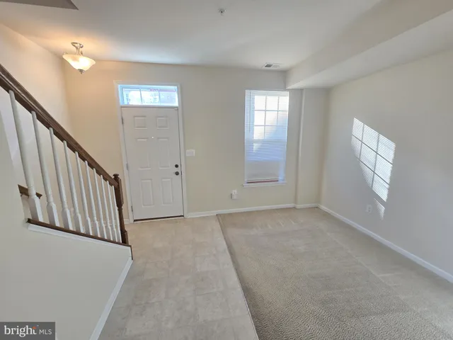 a view of hallway with stairs