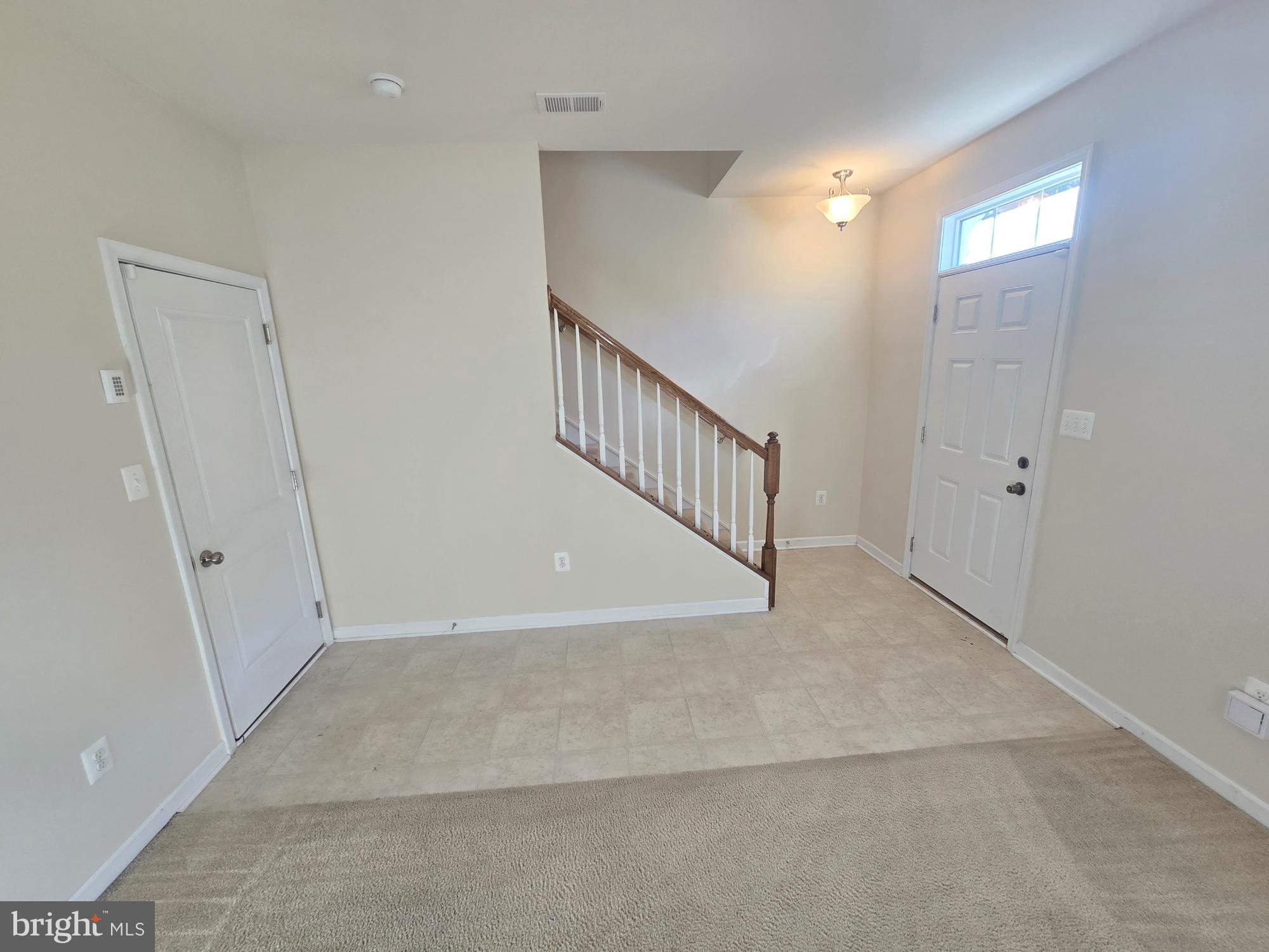 705 South Macon Street Baltimore, MD 21224 - Photo 5 of 29 a view of hallway with stairs