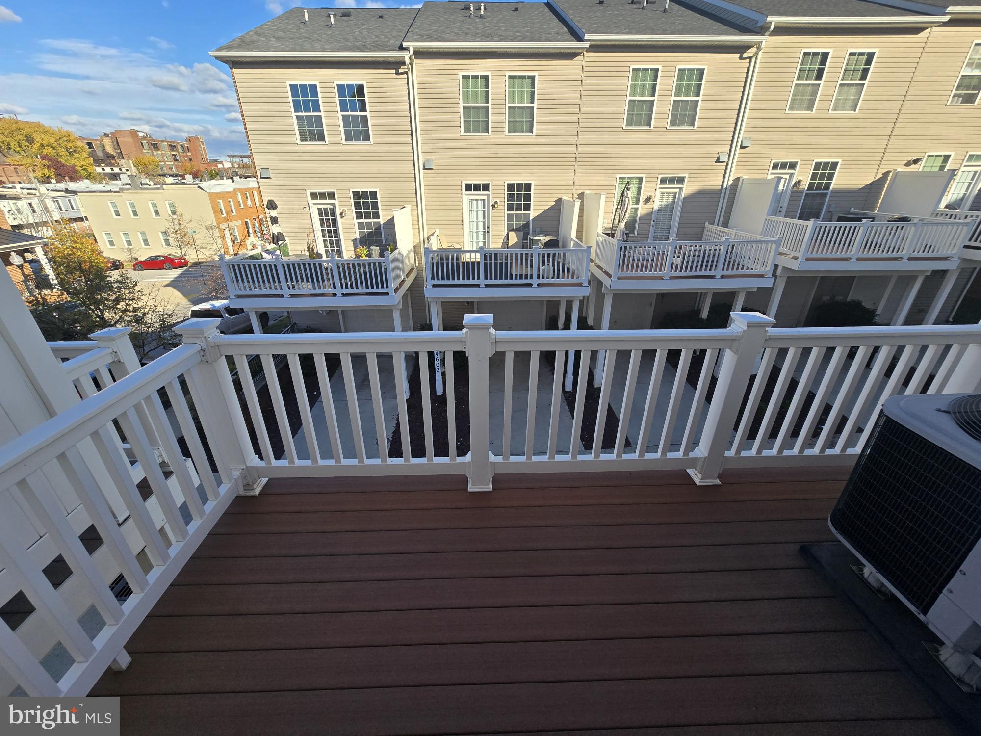 705 South Macon Street Baltimore, MD 21224 - Photo 9 of 29 a view of a balcony with wooden floor and seating space