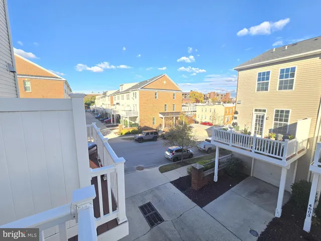 a terrace of a house with outdoor seating