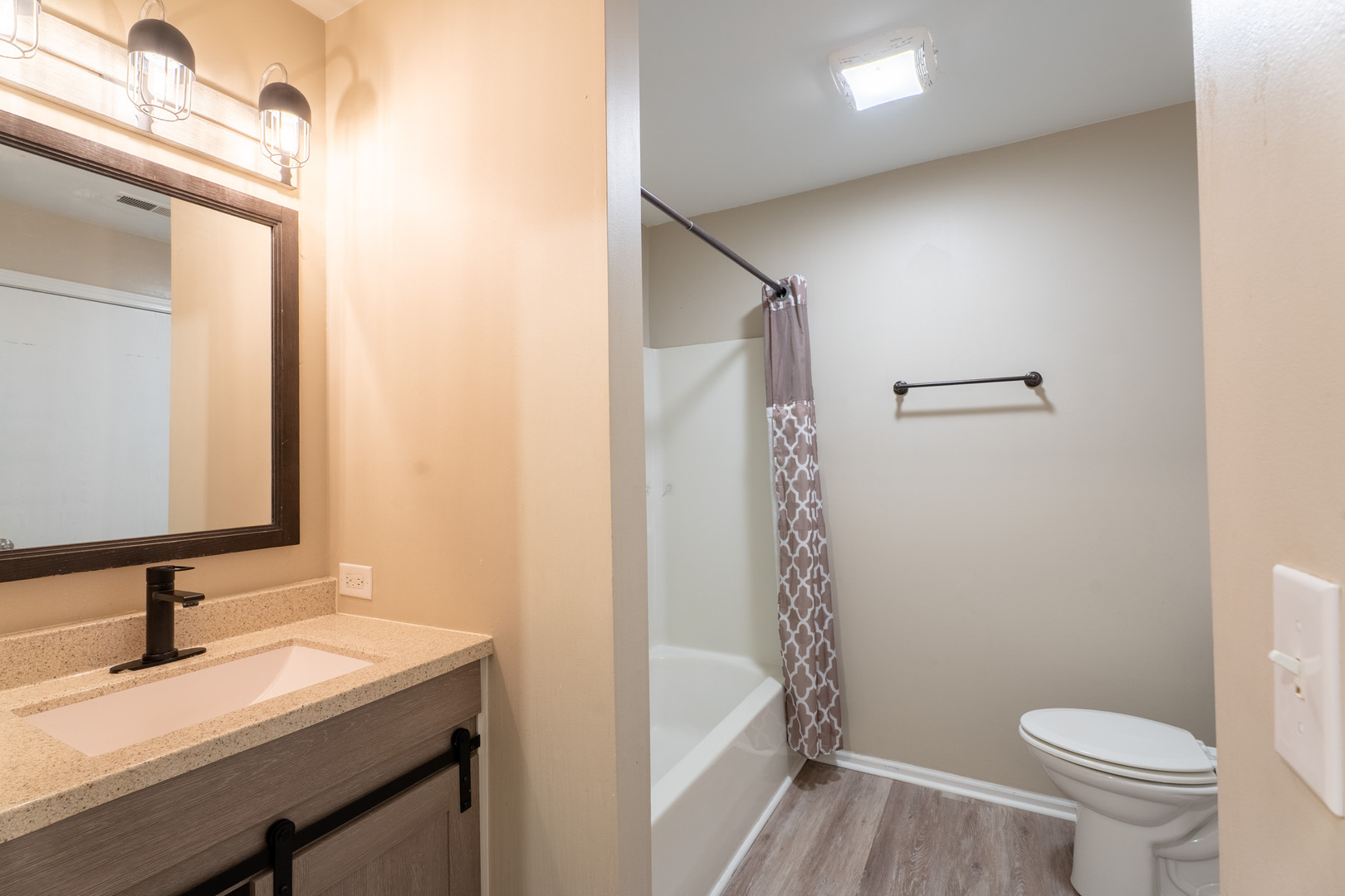 774 Terrace Court, Unit T Elgin, IL 60120 - Photo 13 of 27 a bathroom with a sink a toilet and shower