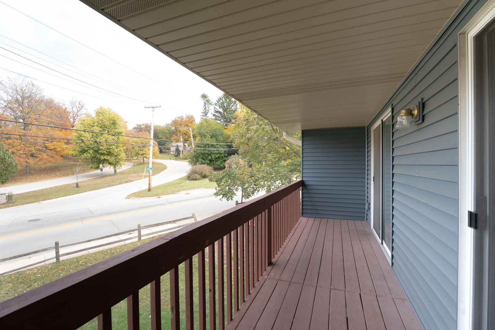 774 Terrace Court, Unit T Elgin, IL 60120 - Photo 20 of 27 a view of balcony with wooden floor
