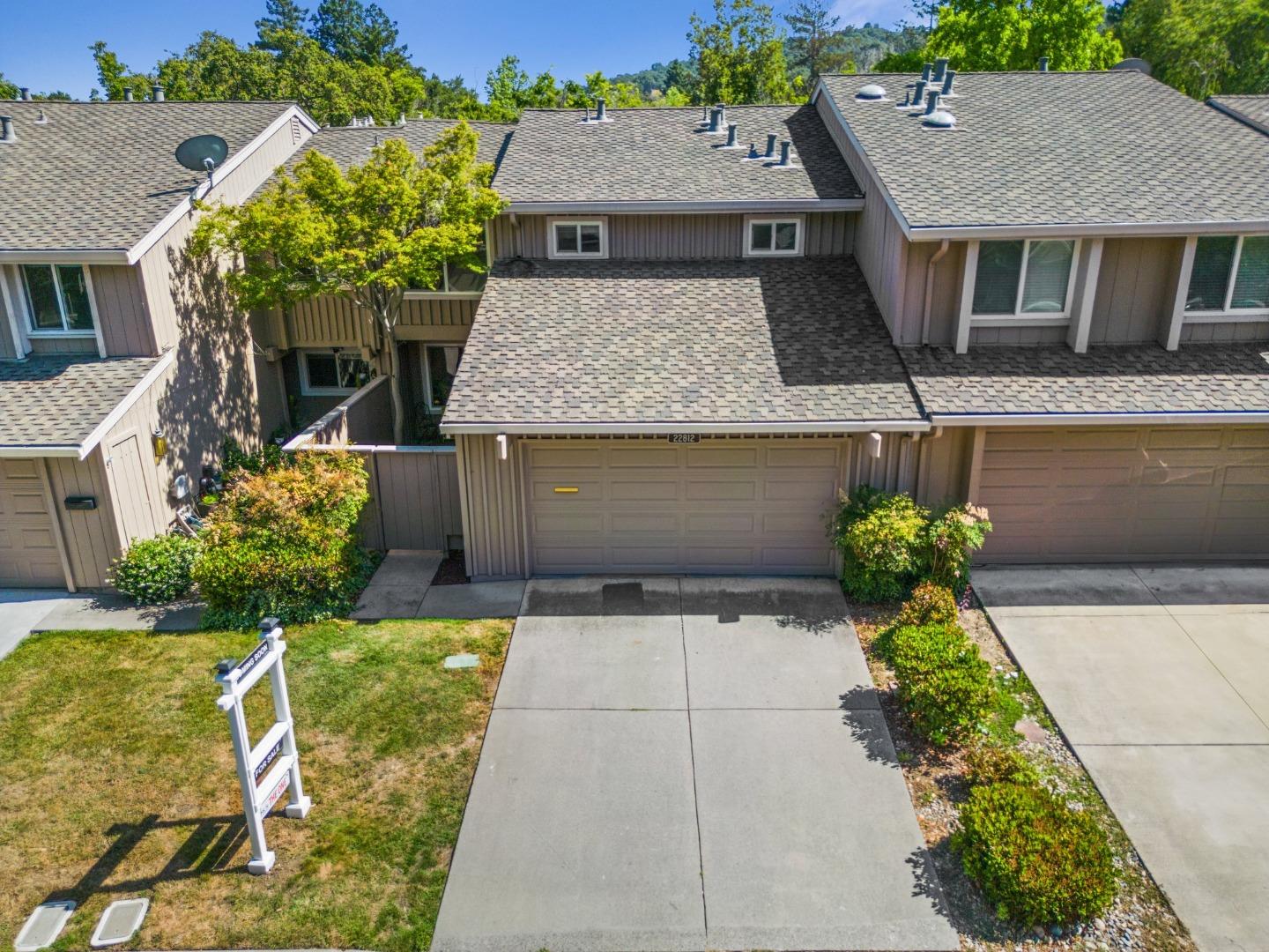 22812 Longdown Road Cupertino, CA 95014 - Photo 11 of 45 front view of a house with a yard