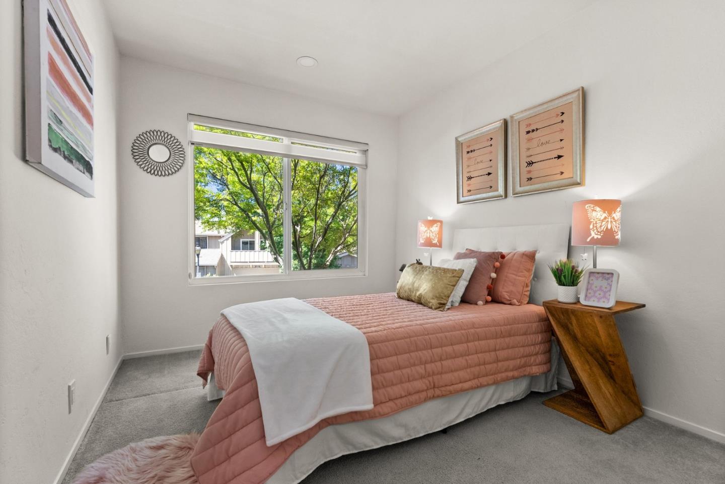 22812 Longdown Road Cupertino, CA 95014 - Photo 25 of 45 a bedroom with a bed and a window