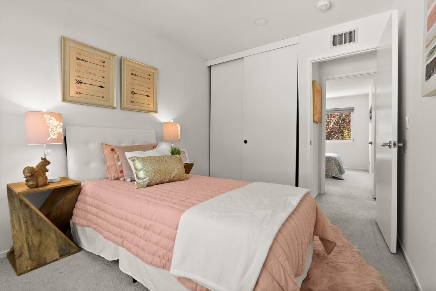 22812 Longdown Road Cupertino, CA 95014 - Photo 26 of 45 a bedroom with a bed and closet