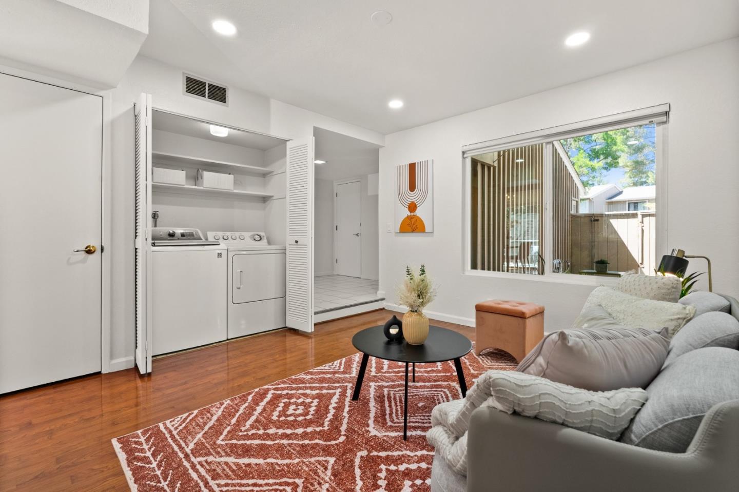 22812 Longdown Road Cupertino, CA 95014 - Photo 7 of 45 a living room with furniture and a rug