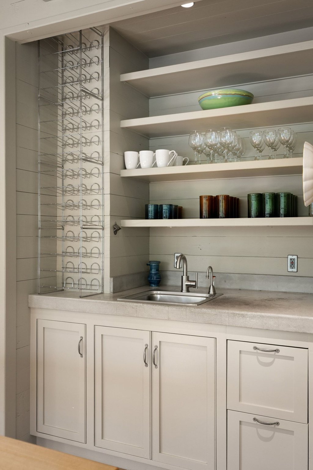 4707 Peace Pipe Path Austin, TX 78746 - Photo 15 of 40 a kitchen with a sink and cabinets