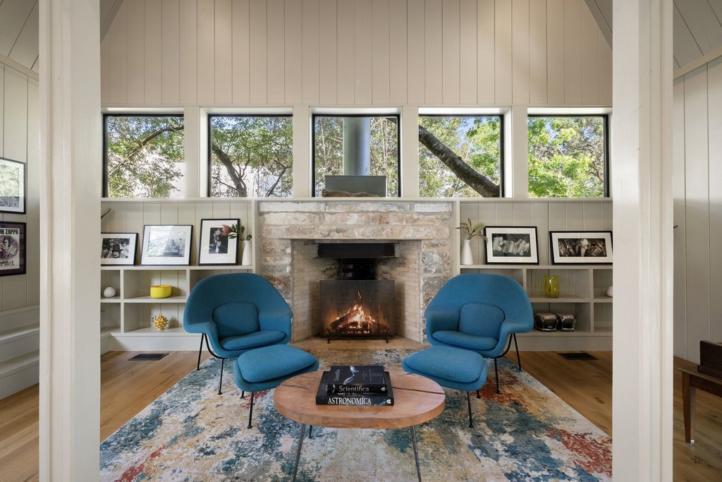 4707 Peace Pipe Path Austin, TX 78746 - Photo 19 of 40 a living room with furniture and a fireplace