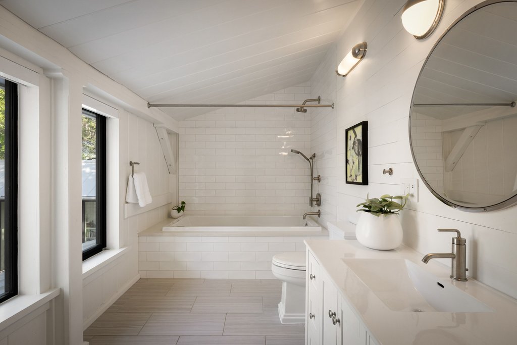 4707 Peace Pipe Path Austin, TX 78746 - Photo 28 of 40 a bathroom with a sink toilet and tub