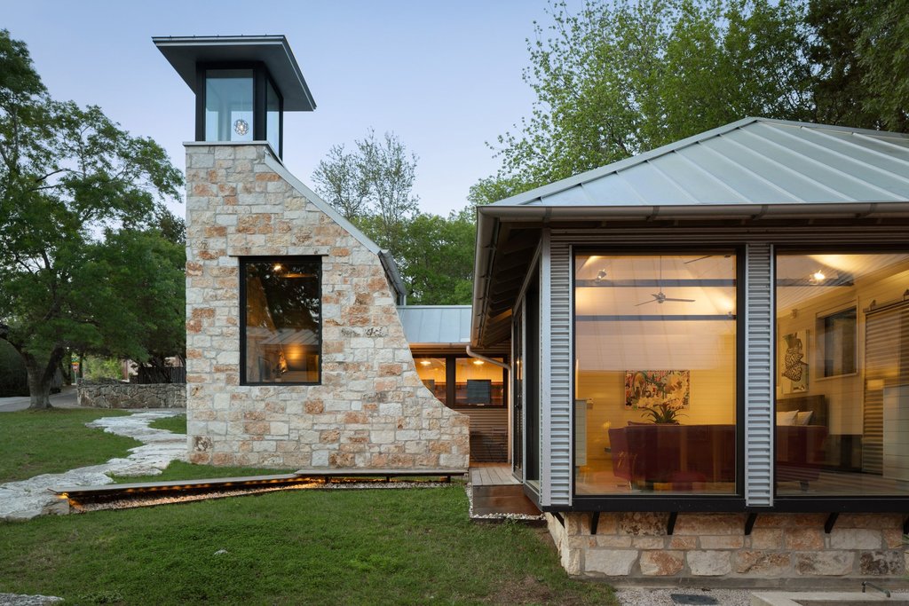 4707 Peace Pipe Path Austin, TX 78746 - Photo 3 of 40 a front view of a house with garden