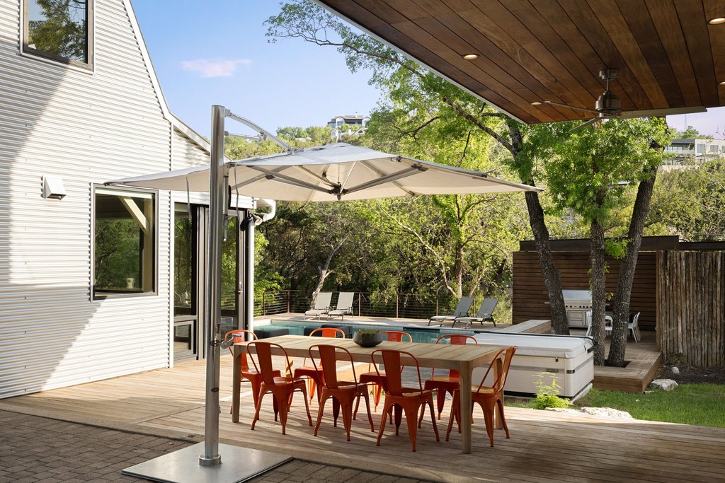 4707 Peace Pipe Path Austin, TX 78746 - Photo 31 of 40 a outdoor view with a sitting space