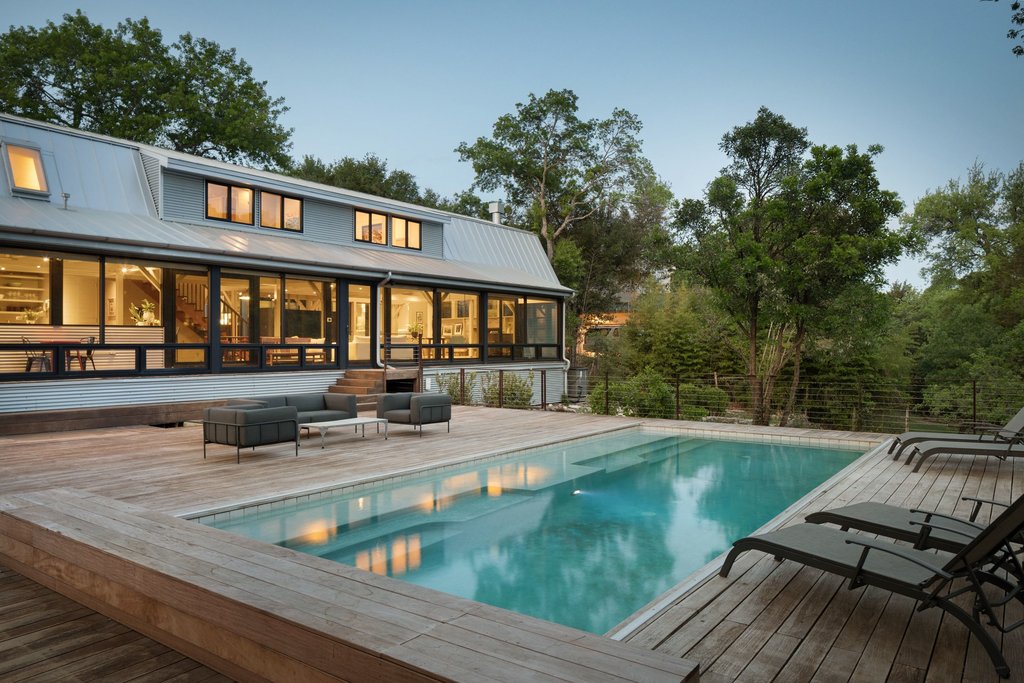 4707 Peace Pipe Path Austin, TX 78746 - Photo 8 of 40 a view of a house with pool and sitting area