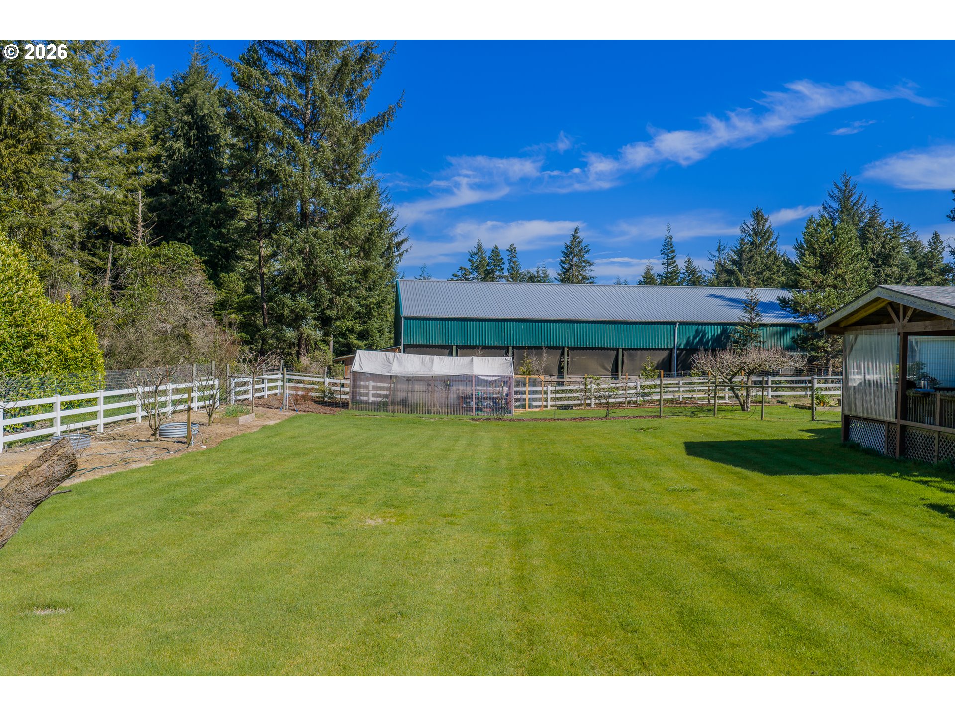 69323 Wildwood Road North Bend, OR 97459 - Photo 30 of 37 a view of swimming pool with outdoor seating and yard in the back