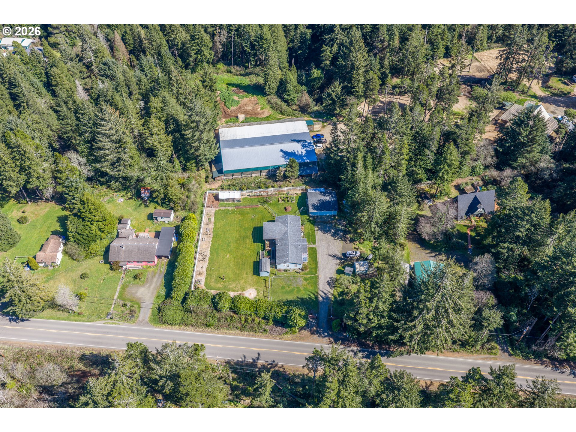 69323 Wildwood Road North Bend, OR 97459 - Photo 32 of 37 an aerial view of multiple house