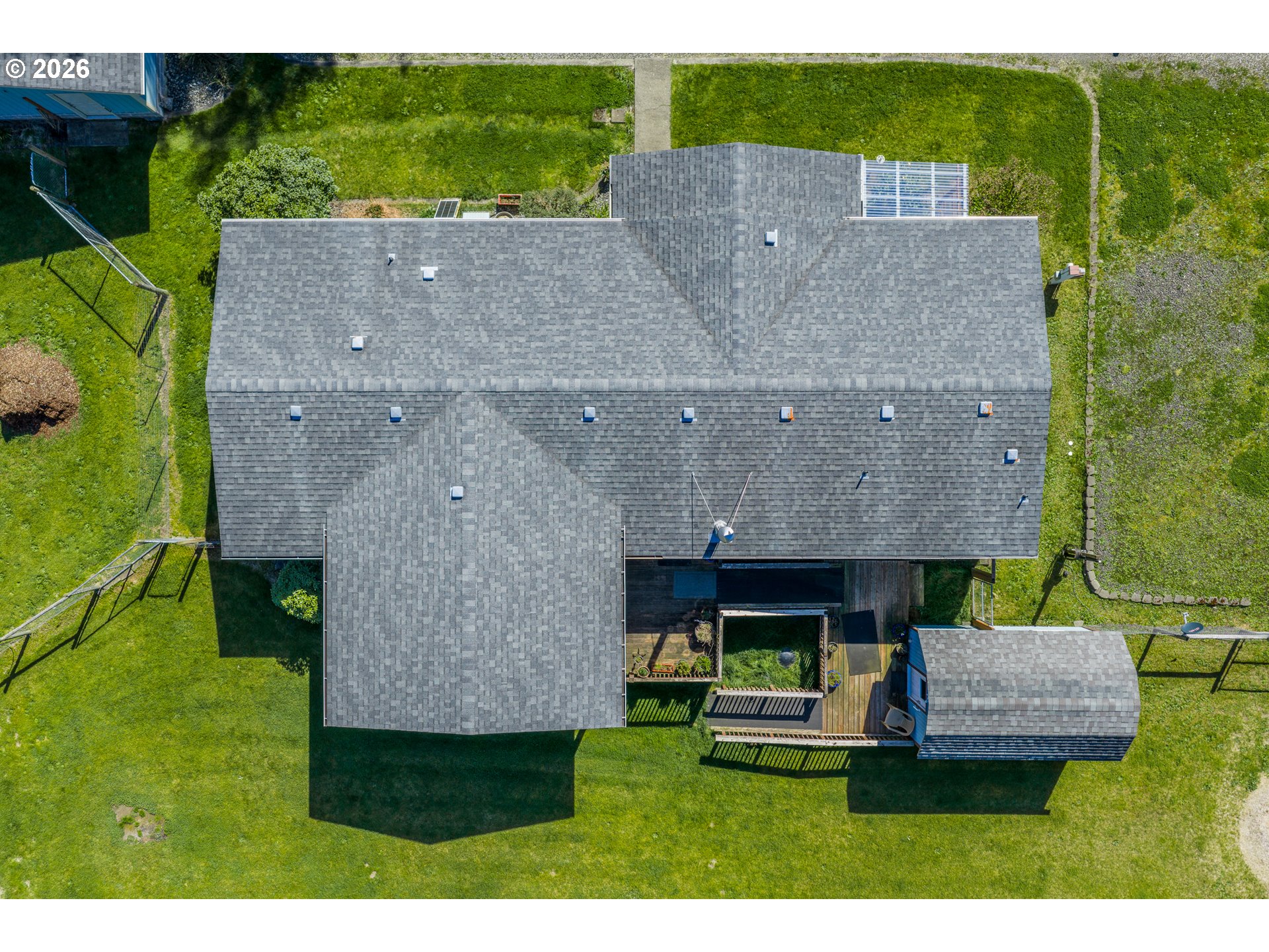69323 Wildwood Road North Bend, OR 97459 - Photo 34 of 37 a aerial view of a house with table and chairs