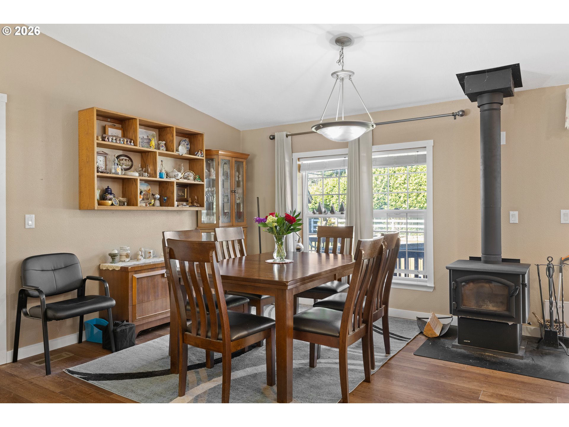 69323 Wildwood Road North Bend, OR 97459 - Photo 6 of 37 a view of a dining room with furniture window and outside view