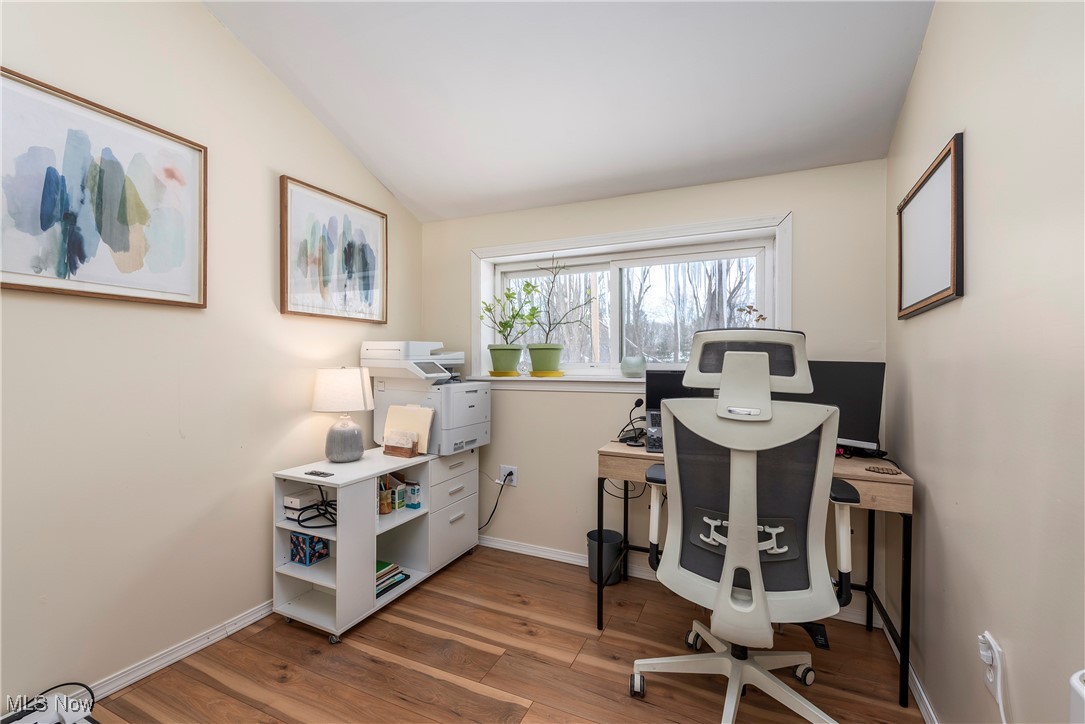 8767 Edgehill Road Mentor, OH 44060 - Photo 24 of 47 Home office with hardwood / wood-style flooring and lofted ceiling