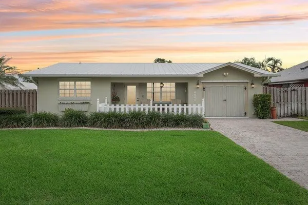 a view of outdoor space yard and front view of a house