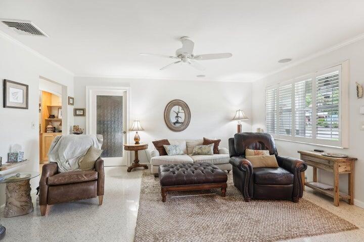 4844 Southeast Pilot Way Stuart, FL 34997 - Photo 11 of 44 a living room with furniture and a large window