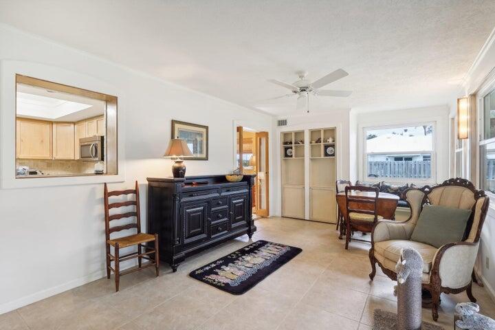 4844 Southeast Pilot Way Stuart, FL 34997 - Photo 14 of 44 a living room with furniture and a large window