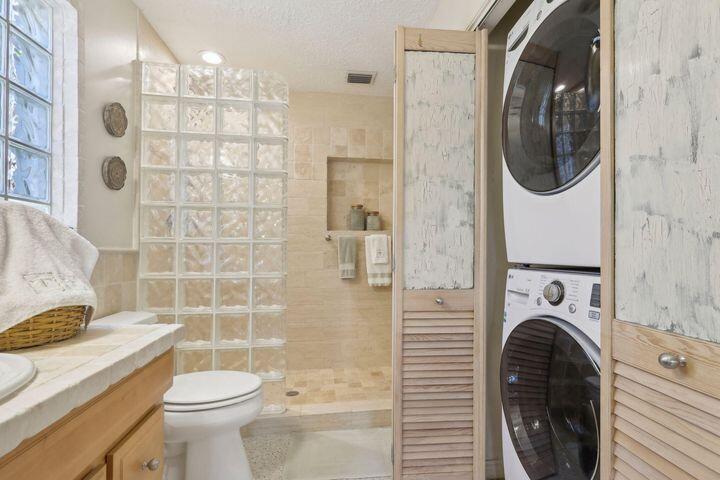 4844 Southeast Pilot Way Stuart, FL 34997 - Photo 22 of 44 a utility room with dryer and washer