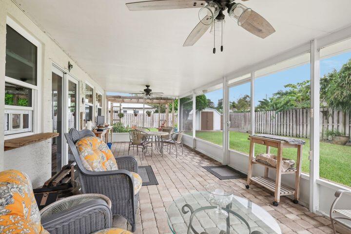 4844 Southeast Pilot Way Stuart, FL 34997 - Photo 29 of 44 a living room with furniture