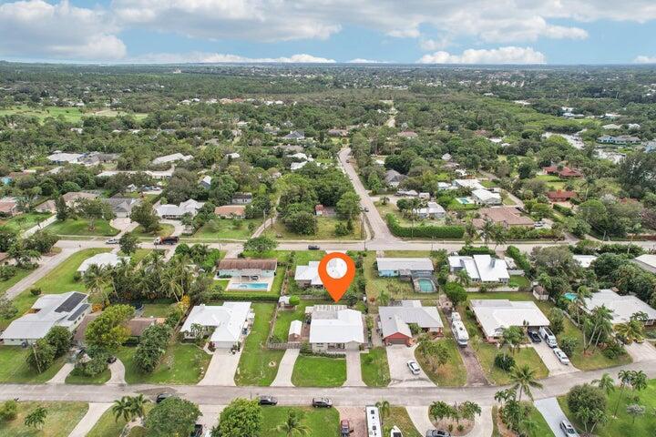 4844 Southeast Pilot Way Stuart, FL 34997 - Photo 37 of 44 an aerial view of residential houses with outdoor space