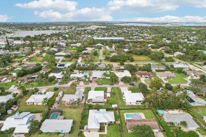 4844 Southeast Pilot Way Stuart, FL 34997 - Photo 43 of 44 an aerial view of residential houses with outdoor space