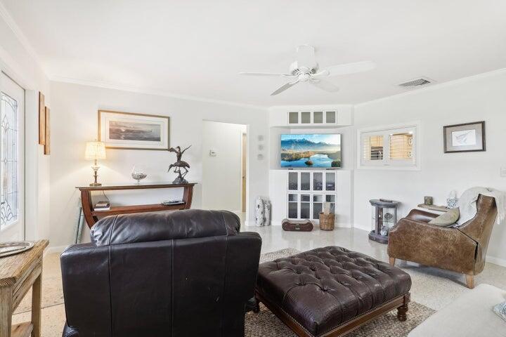4844 Southeast Pilot Way Stuart, FL 34997 - Photo 9 of 44 a living room with furniture rug and window
