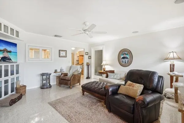 a living room with furniture and a window