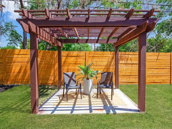 a view of yard with patio
