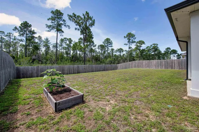a garden view with a seating space