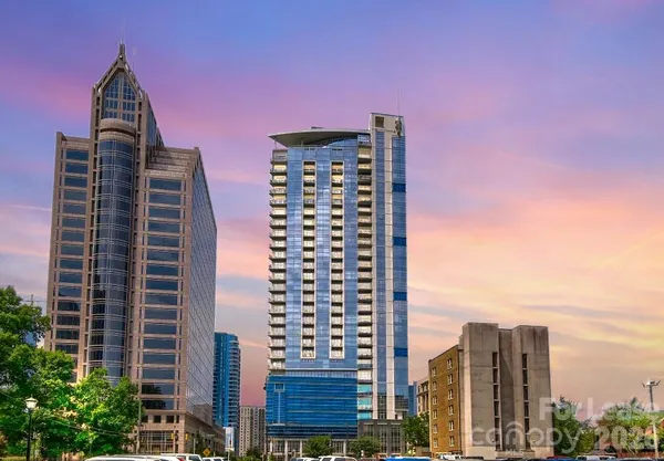 a view of a city with tall buildings