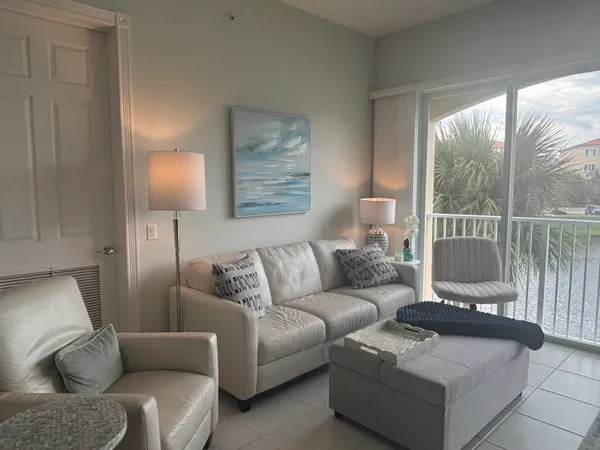 a living room with furniture and a window