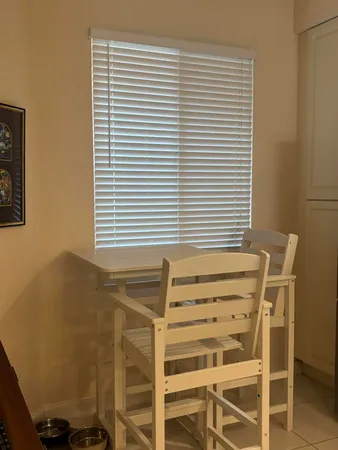 a view of a room with windows