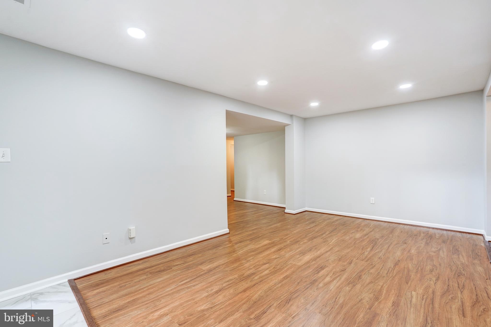 8314 Tobin Road, Unit T3 Annandale, VA 22003 - Photo 6 of 31 Living room with wood floor
