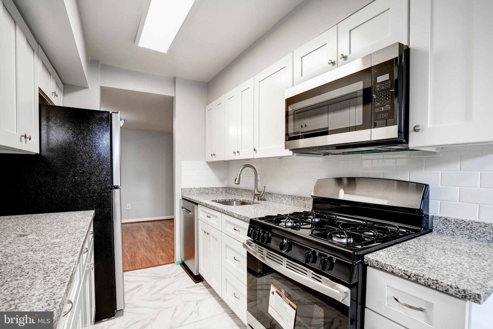 8314 Tobin Road, Unit T3 Annandale, VA 22003 - Photo 8 of 31 Updated kitchen w/ brand new appliances