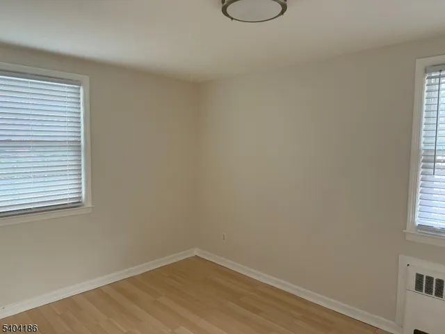 a view of a room that has a window in it
