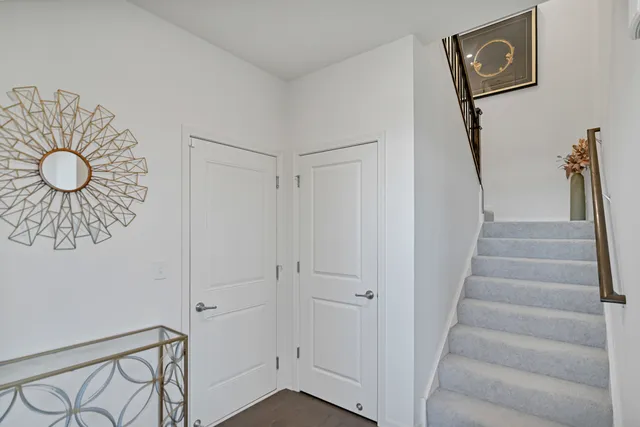a view of entryway with wooden floor