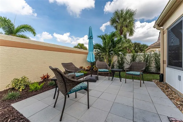 a view of a lounge chairs in the patio