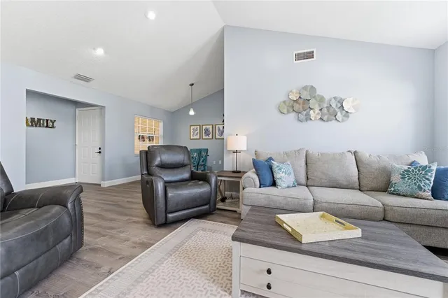 a living room with furniture and a couch