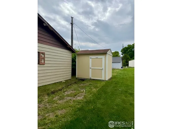 a house view with a backyard space