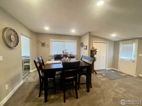 a view of a dining room with furniture