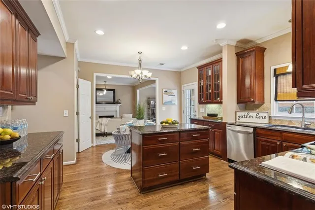a living room with furniture a window and dining table